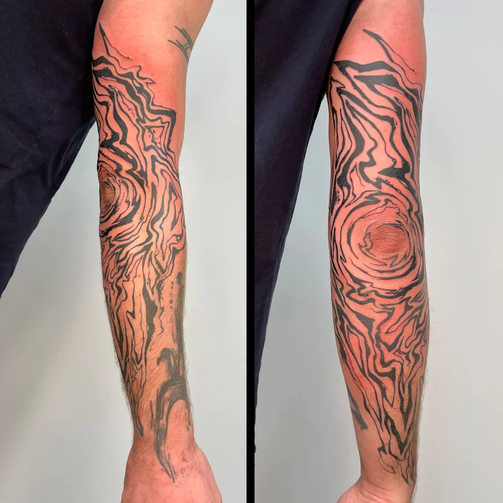 floating lines tattoo auf dem Arm