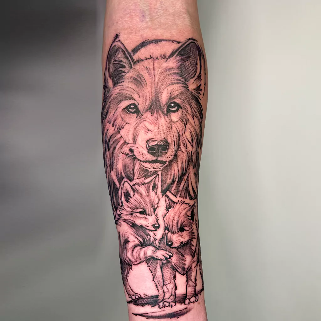 sketchy tattoo einer Wolfsfamilie